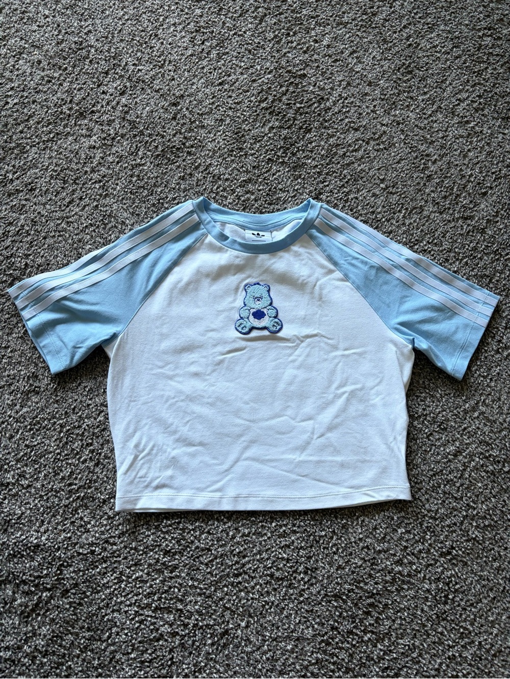 adidas x Care Bears White Tee w/ Light Blue Raglan Sleeves and Grumpy Bear Patch